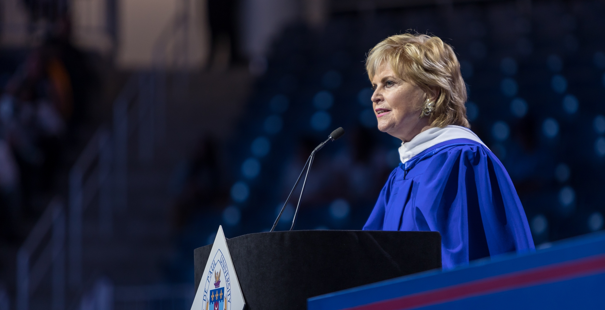 Carol Marin, journalist and co-director of the Center for Journalism Integrity and Excellence at DePaul, presents the address to the graduates at the commencement ceremony for the College of Communication and the College of Computing and Digital Media. (DePaul University/Jeff Carrion)
